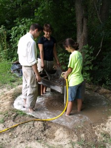 Summer 2012 interns take a break from the heat to learn how to water-screen!